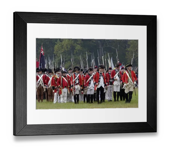 Framed Print : British army marches onto the field in a reenactment of the surrender Framed Print : British army marches onto the field in a reenactment of the surrender