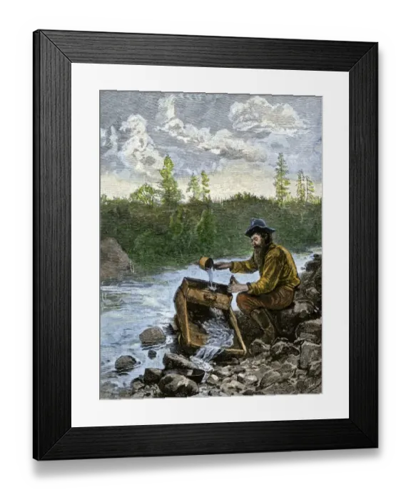 Framed Print : Prospector washing pebbles from a stream using a cradle device to sparate gold Framed Print : Prospector washing pebbles from a stream using a cradle device to sparate gold