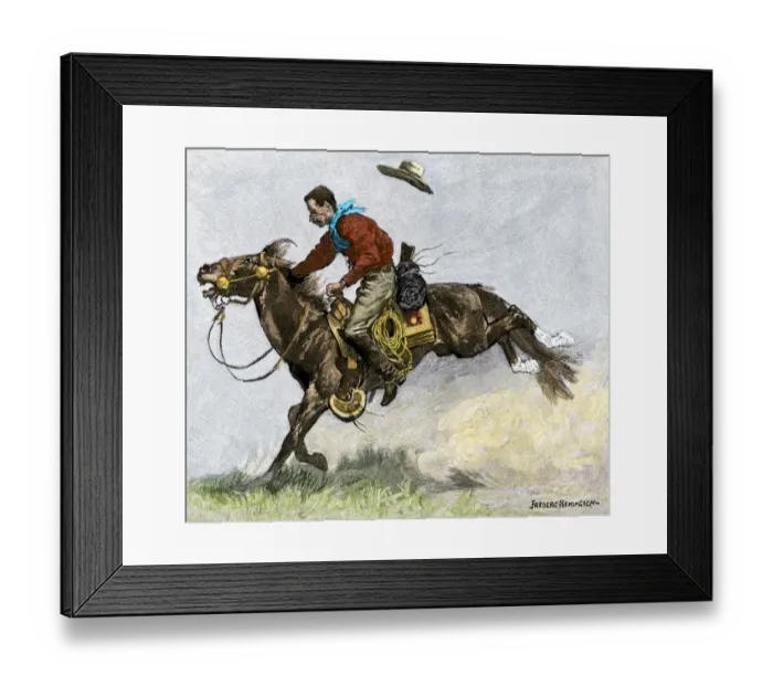 Framed Print : Cowboy riding a newly trained horse Framed Print : Cowboy riding a newly trained horse
