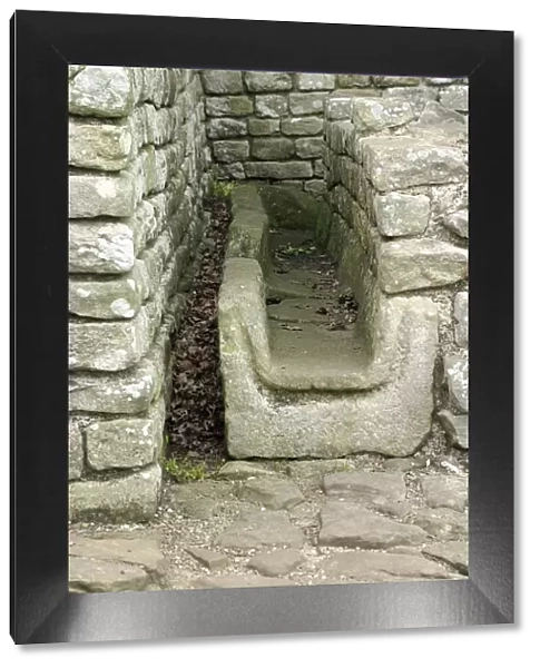 Ancient Roman urinal at Chesters, Northumbria, England