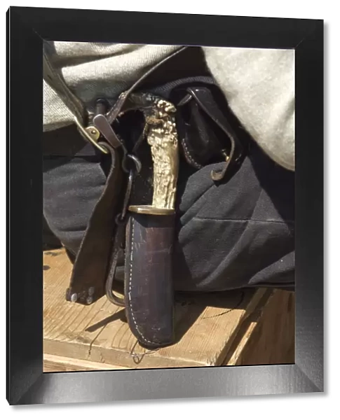 Civil War knife in a leather sheath