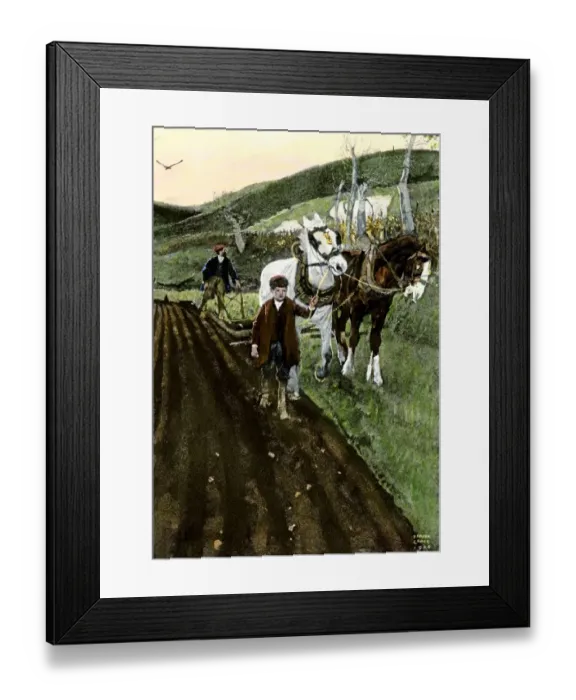 Framed Print : Father and son plowing a field Framed Print : Father and son plowing a field