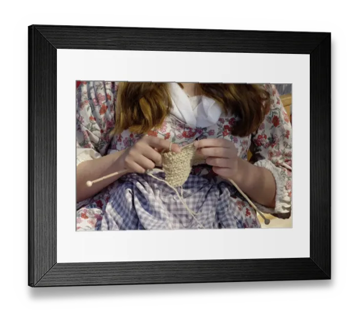 Framed Print : Woman reenactor knitting at Yorktown battlefield