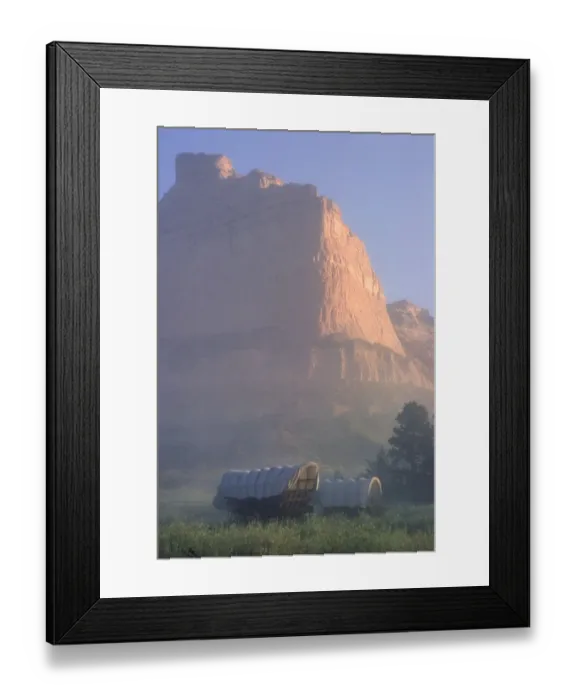 Framed Print : Covered wagons on the Oregon Trail at sunrise Framed Print : Covered wagons on the Oregon Trail at sunrise