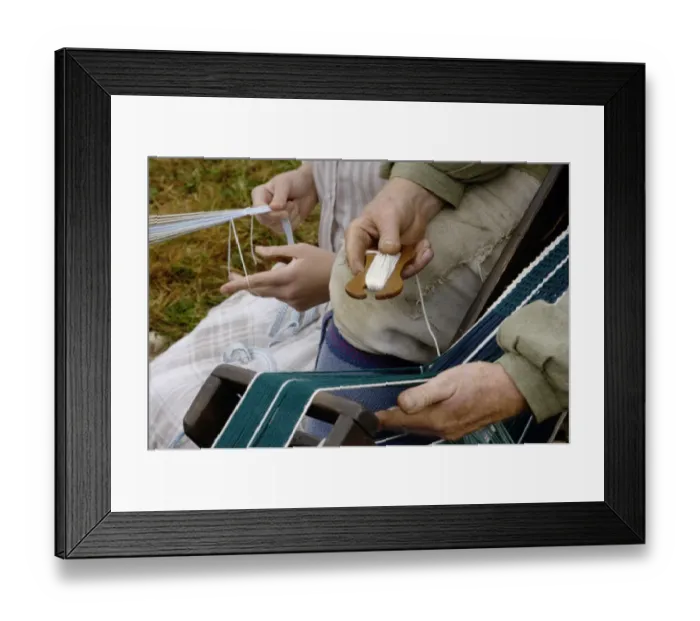 Framed Print : Reenactors weaving on belt looms at a Revolutionary War reenactment Framed Print : Reenactors weaving on belt looms at a Revolutionary War reenactment
