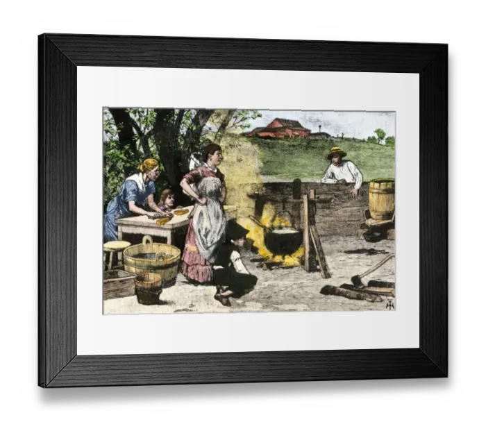 Framed Print : Women rendering lard in a kettle to make soap the old-fashioned way Framed Print : Women rendering lard in a kettle to make soap the old-fashioned way