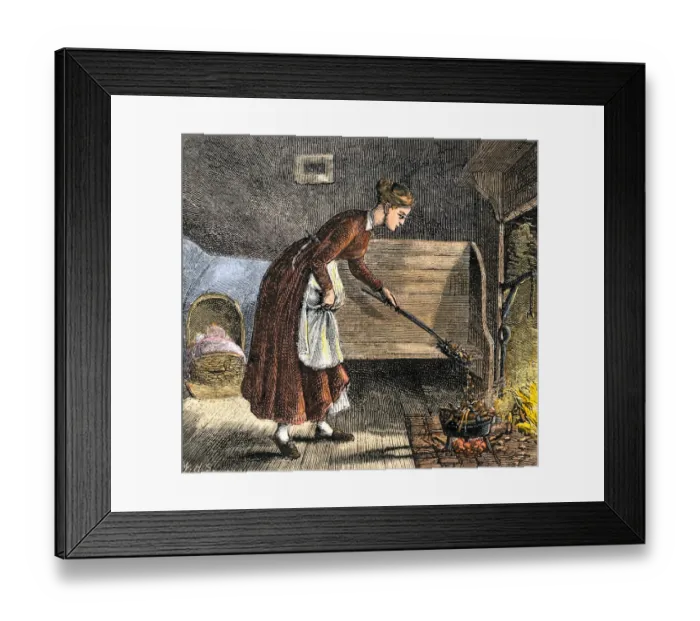 Framed Print : Pioneer mother cooking with a bake-kettle in the fireplace Framed Print : Pioneer mother cooking with a bake-kettle in the fireplace