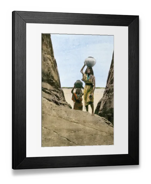 Framed Print : Ancestral Puebloan / Anasazi women carrying water in pots up to a mesa top Framed Print : Ancestral Puebloan / Anasazi women carrying water in pots up to a mesa top