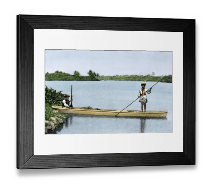 Framed Print : Seminoles in their dugout canoe made from a cypress log