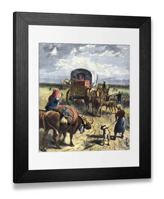 Framed Print : Covered wagon of a homesteader family heading west with their belongings Framed Print : Covered wagon of a homesteader family heading west with their belongings