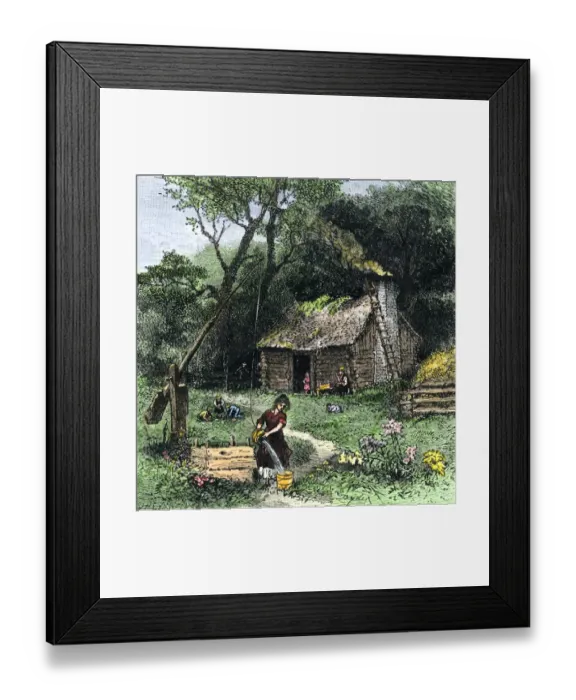 Framed Print : Pioneer woman getting water from a well near her log cabin Framed Print : Pioneer woman getting water from a well near her log cabin