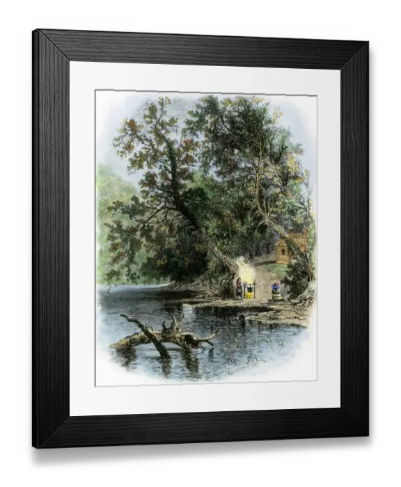 Framed Print : Pioneer woman cooking outside a log cabin Framed Print : Pioneer woman cooking outside a log cabin