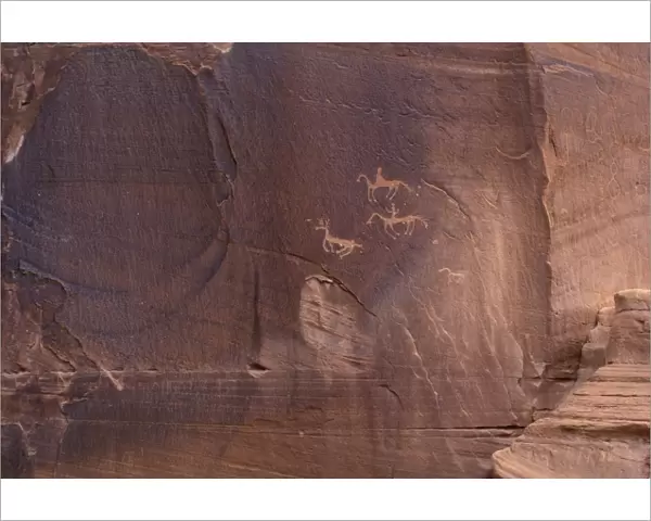 Native Americans on horseback petroglyph