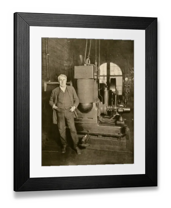 Framed Print : Thomas Edison with the dynamo that generated the first commercial electric Framed Print : Thomas Edison with the dynamo that generated the first commercial electric