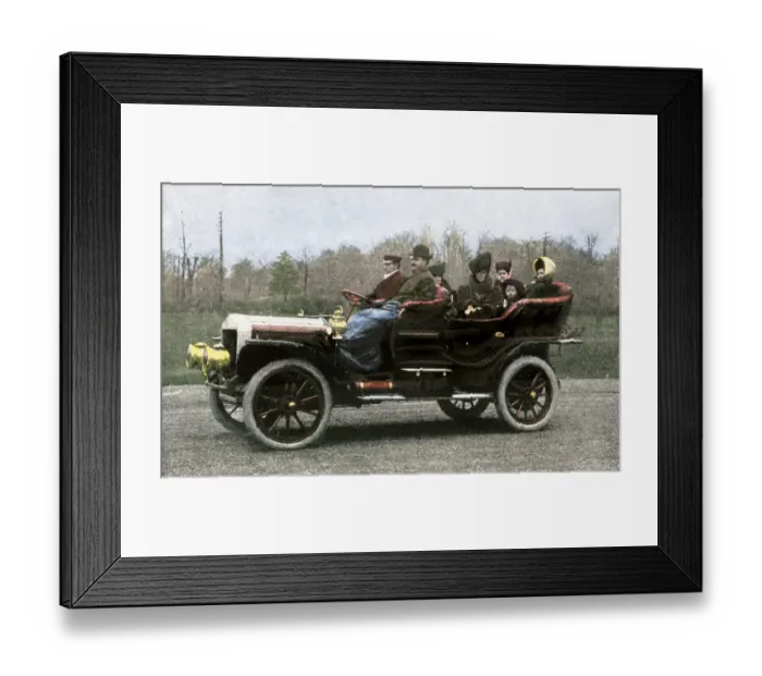 Framed Print : Family riding in a steam-powered White Company automobile