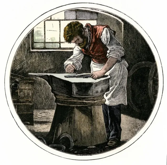 Framed Print : Blacksmith working at an anvil Framed Print : Blacksmith working at an anvil