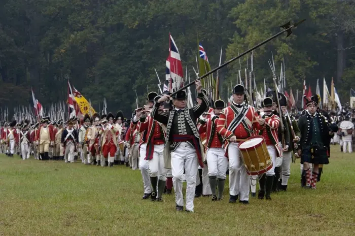 Framed Print : British army takes the field in a reenactment of the surrender at Yorktown Framed Print : British army takes the field in a reenactment of the surrender at Yorktown