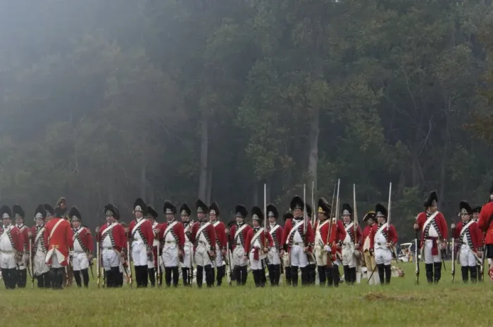 Framed Print : British army takes the field in a reenactment of the surrender at Yorktown Framed Print : British army takes the field in a reenactment of the surrender at Yorktown