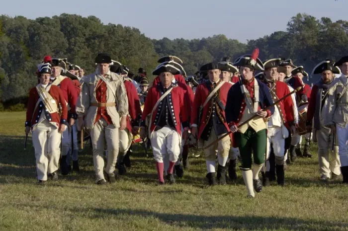 Framed Print : British troops marching in a reenactment on the Yorktown battlefield Framed Print : British troops marching in a reenactment on the Yorktown battlefield