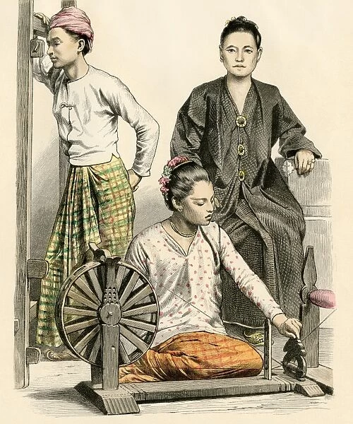 Burmese women and a spinning wheel