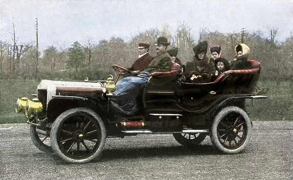 BUSN2A-00244. Family riding in a steam-powered White Company automobile, 1907.