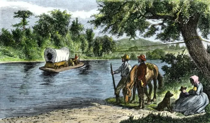 Framed Print : Covered wagon crossing a river by rope ferry Framed Print : Covered wagon crossing a river by rope ferry