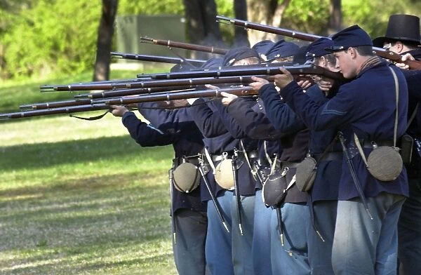 EVCW2D-00183. Union infantry reenactors firing their rifles at Shiloh National