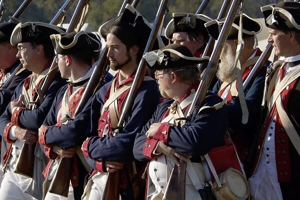 EVRV2D-00163. Continental Army soldiers reenact a march at Yorktown battlefield, Virginia.