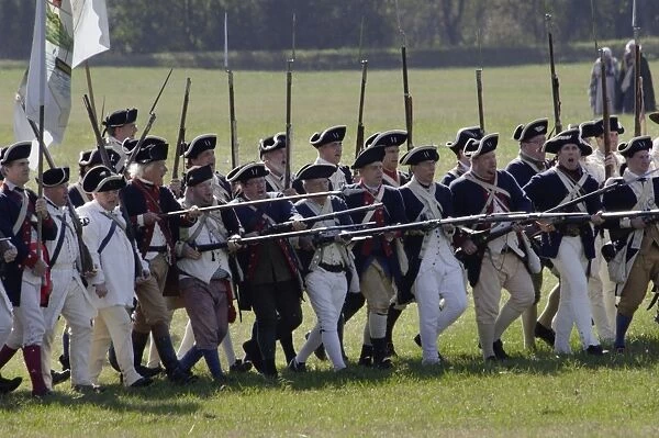 EVRV2D-00168. Continental Army reenactors advance at Yorktown battlefield, Virginia.