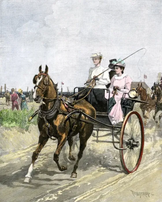 Framed Print : Fashionable young women driving a carriage on the beach Framed Print : Fashionable young women driving a carriage on the beach