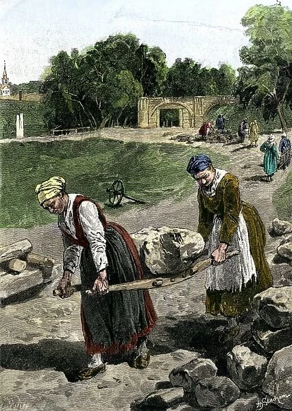 GEUR2A-00055. Russian peasant women at work, carrying large stones on a litter.