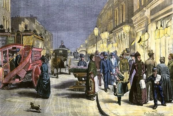 GGBR2A-00007. London street scene at night with electric lighting, about 1890.