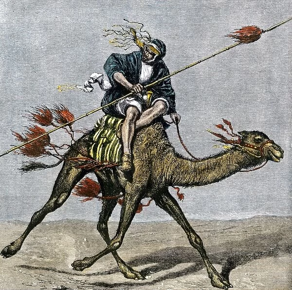 GMDE2A-00007. Bedouin messenger racing across the desert on a camel.