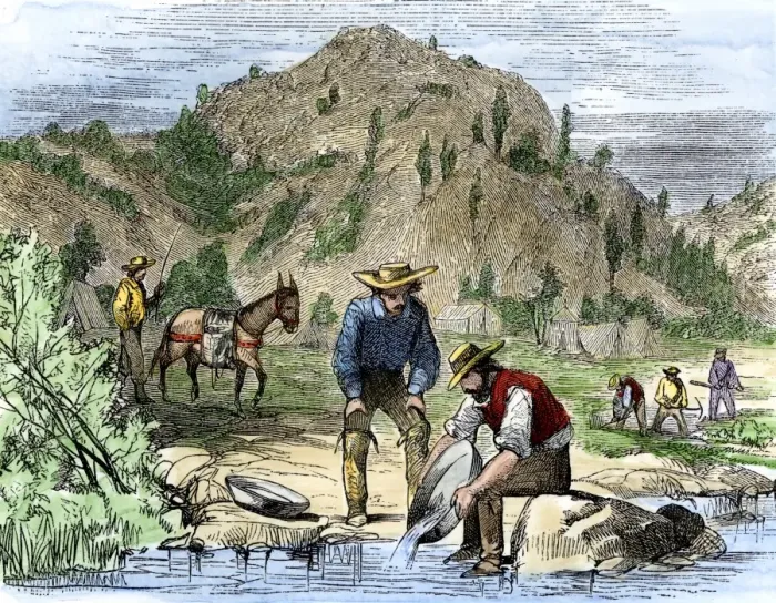 Framed Print : Gold Rush prospectors washing sediments from a stream to find nuggets in