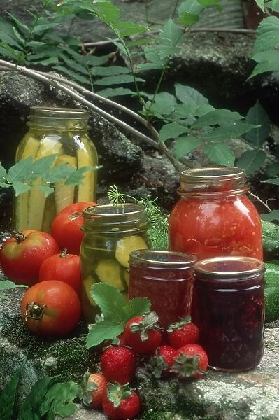 Homemade jam, pickles, and canned tomatoes
