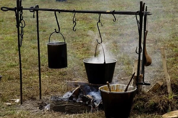 HOUS2D-00029. Cooking over an open fire at a Continental Army camp reenactment