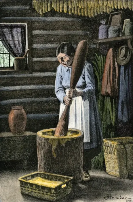 Framed Print : Iroquois woman pounding dried corn in a large wooden mortar in her cabin Framed Print : Iroquois woman pounding dried corn in a large wooden mortar in her cabin