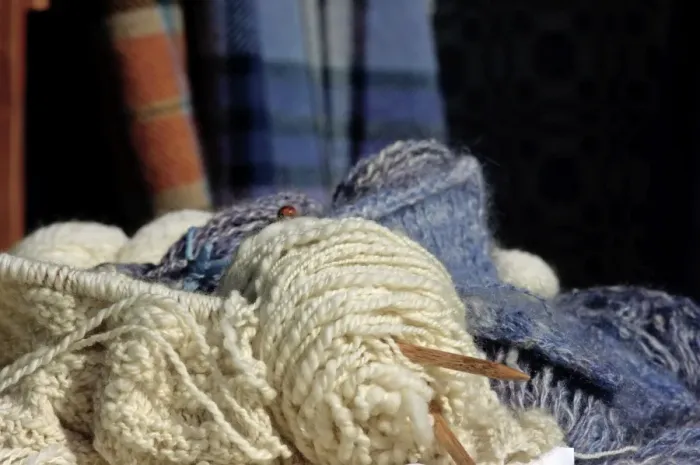 Framed Print : Knitting needles and handspun wool at a Yorktown reenactment