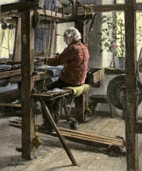 Framed Print : Man weaving on a large hand-loom Framed Print : Man weaving on a large hand-loom