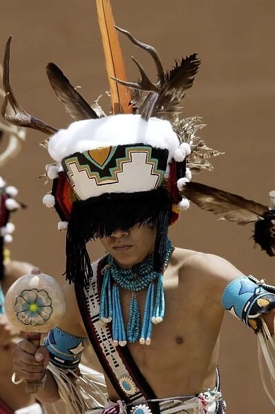 NATI2D-00481. Zuni Pueblo Red-Tailed Hawk Dancer performing the Deer Dance