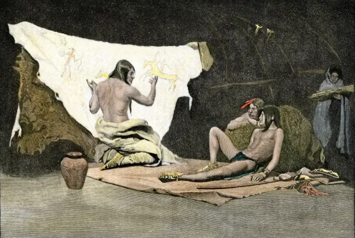 Framed Print : Native American shaman using pictures on a buffalo robe to cure a young mans Framed Print : Native American shaman using pictures on a buffalo robe to cure a young mans