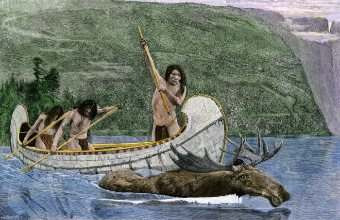 Framed Print : Native Americans in a canoe hunting a moose Framed Print : Native Americans in a canoe hunting a moose