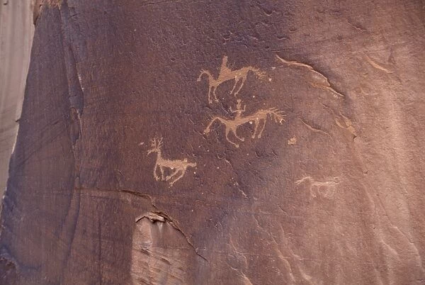 Native Americans on horseback petroglyph