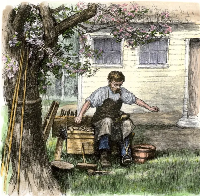 Framed Print : Old-time shoemaker working outdoors Framed Print : Old-time shoemaker working outdoors