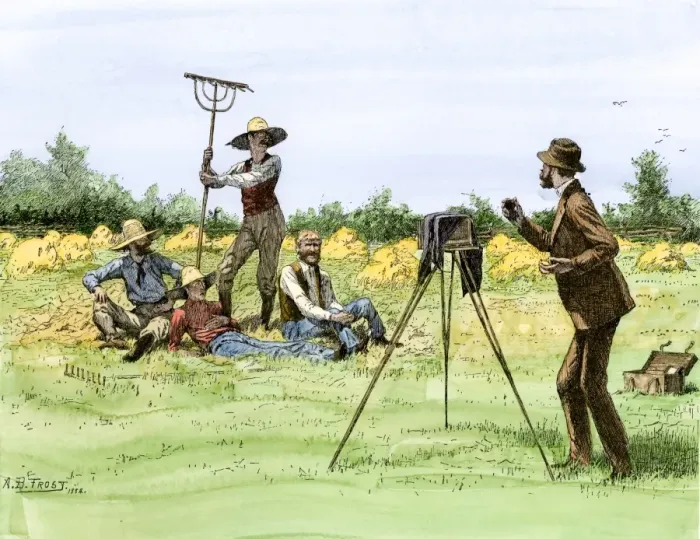 Framed Print : Traveling photographer taking a picture of farmers in their field Framed Print : Traveling photographer taking a picture of farmers in their field