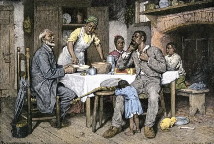 Framed Print : Visiting pastor having dinner with an African-American family