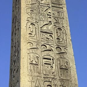 Ancient Egyptian hieroglyphics on an obelisk in Paris