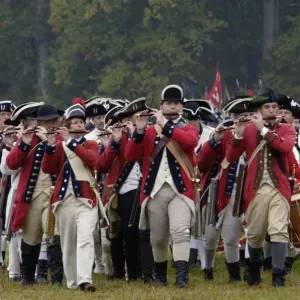 British fife and drum corps takes the field in a reenactment of the surrender British fife and drum corps takes the field in a reenactment of the surrender