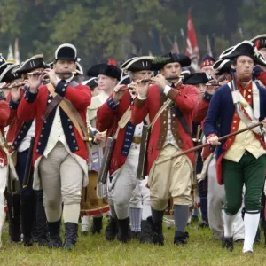 British fife and drum corps takes the field in a reenactment of the surrender British fife and drum corps takes the field in a reenactment of the surrender