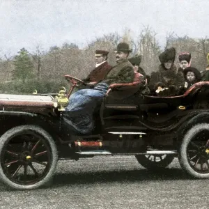 Print of a family in a steam-powered automobile, 1907